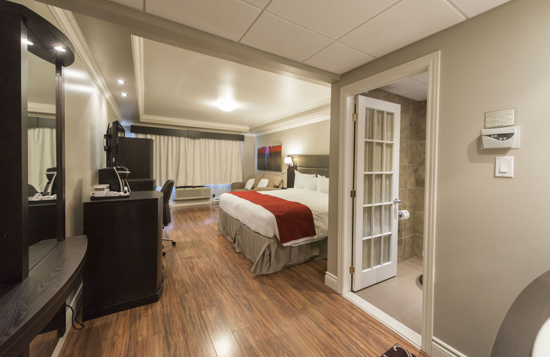 Bedroom 3, Hôtel & Suites Le Dauphin Drummondville, Drummond