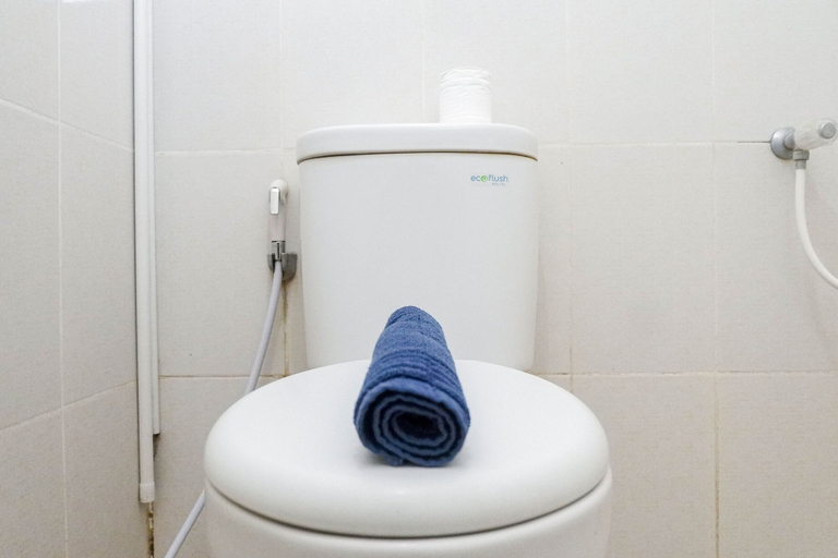Bathroom 3, Lavish 2BR Apartment at Educity Pakuwon, Surabaya