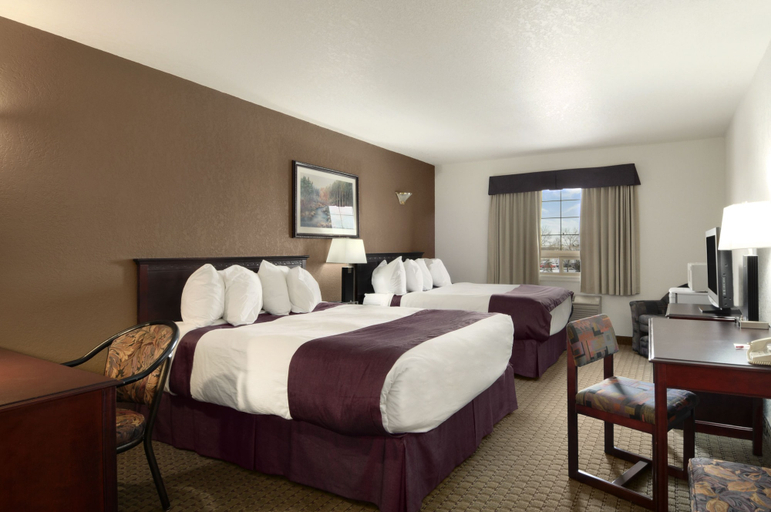 Bedroom 3, Ramada by Wyndham Red Deer Hotel and Suites, Division No. 8