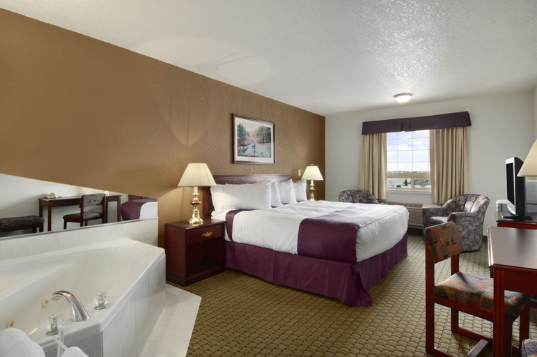 Bedroom 3, Ramada by Wyndham Red Deer Hotel and Suites, Division No. 8
