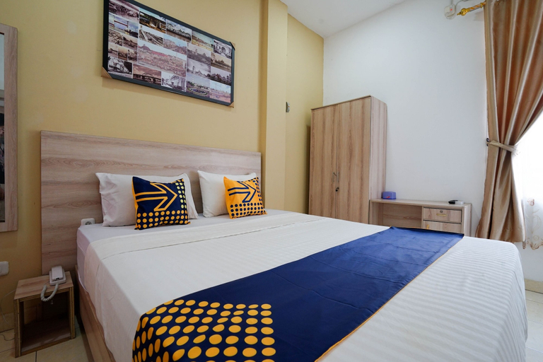 Bedroom 1, OYO 2869 Ionia Homestay, Palembang