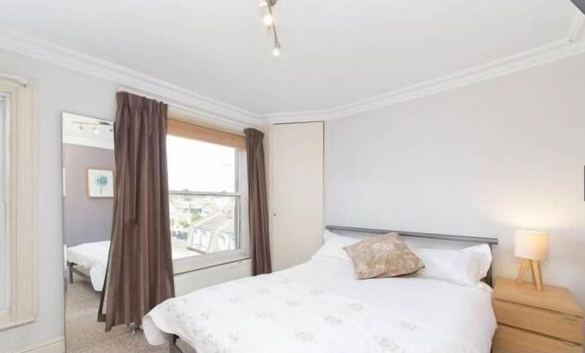 Bedroom 2, Kensington Olympia Apartments, London