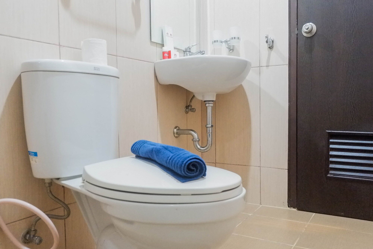 Bedroom 2, Homey 2BR Apartment at Tamansari Papilio By Travelio, Surabaya