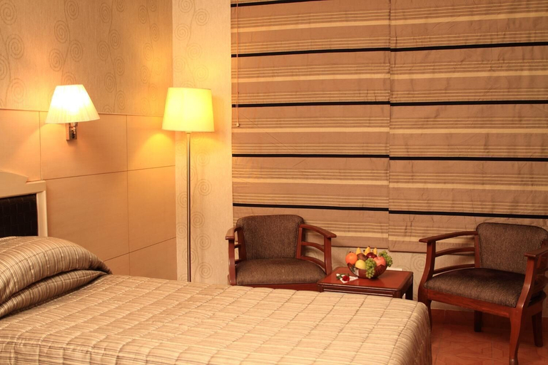 Bedroom 3, Hotel Basant Residency, Bangalore
