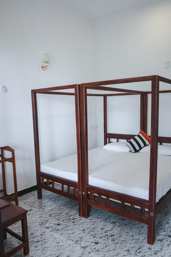Bedroom 4, Sunset view beach hotel, Pothuvil