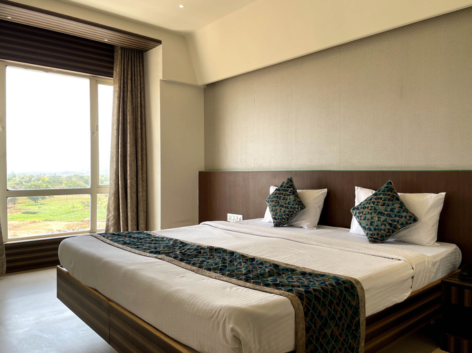 Bedroom 4, Hotel Grand Parivaar, Nashik
