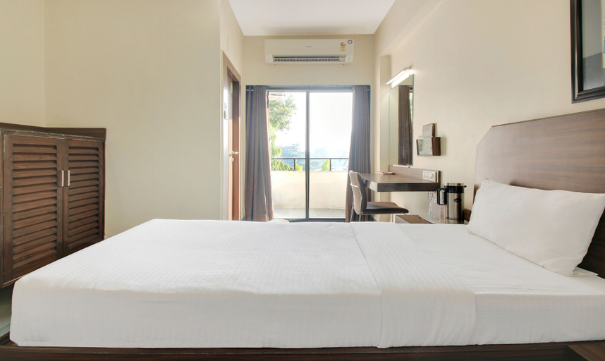Bedroom 3, Hotel Hospice, Surat