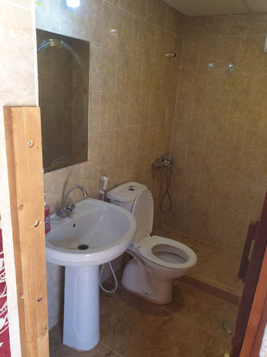 Bathroom 4, Salman Zwaidh Camp, Quaira