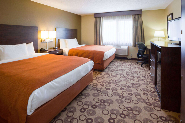 Bedroom 3, AmericInn by Wyndham Blue Earth, Faribault
