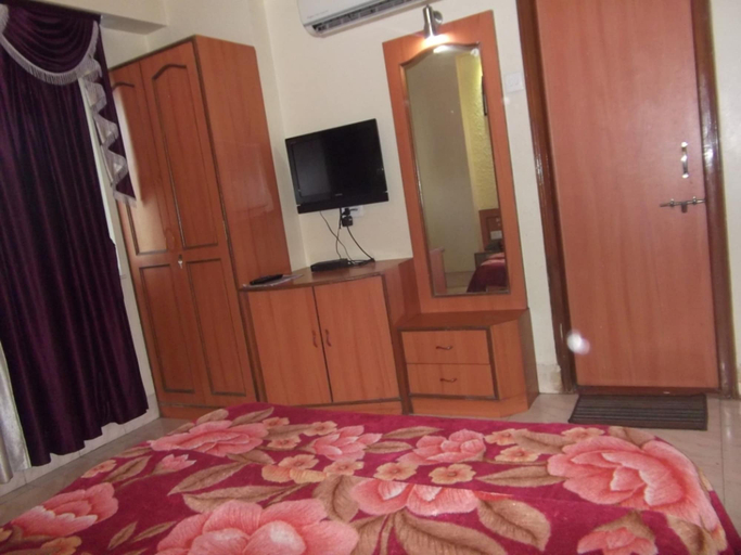 Bedroom 3, Hotel Ravikant, Pune
