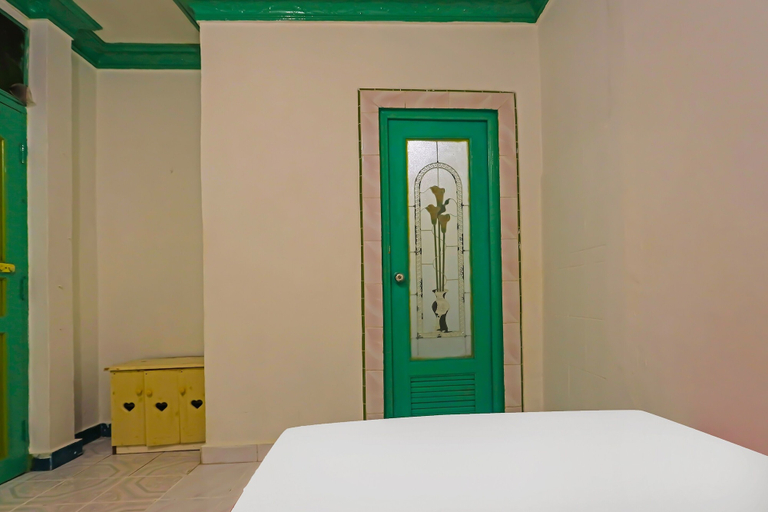 Bedroom 2, Hotel O Homestay Bude Sri, Batam
