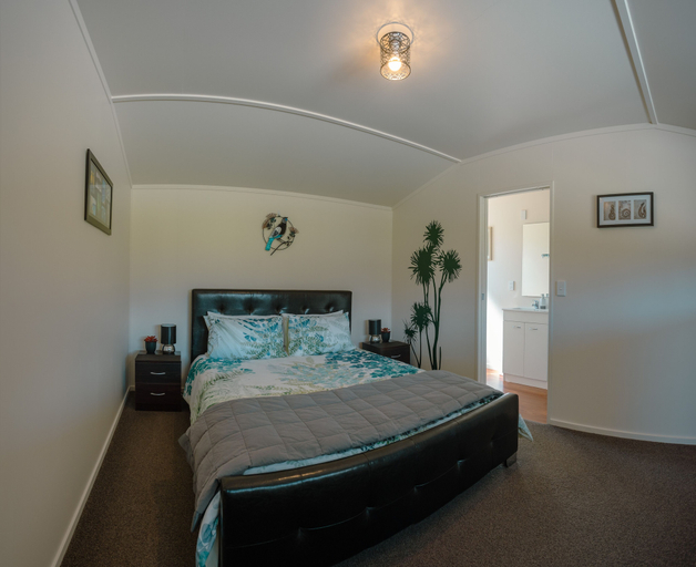Bedroom 4, Te Awa Cottages, Westland
