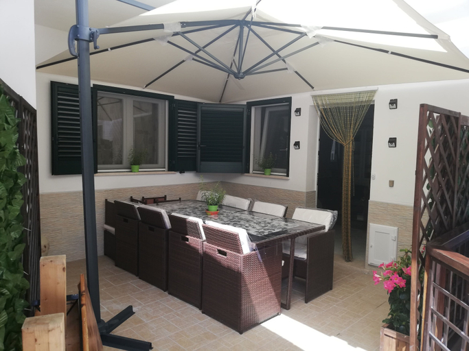 Others 5, Casa Tiziana, Brindisi