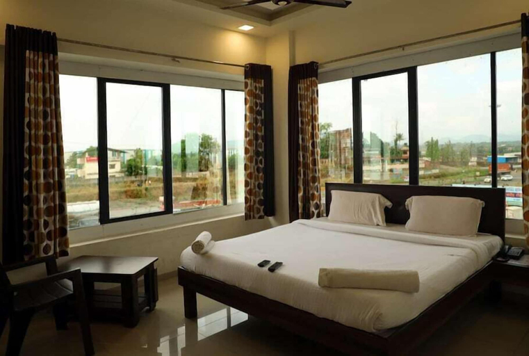 Bedroom 5, Hotel Krushna Express Inn, Nashik