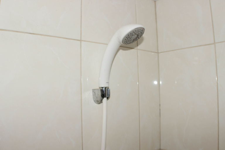 Bathroom 4, Fancy Studio at Springlake Summarecon Bekasi Apartment By Travelio, Bekasi