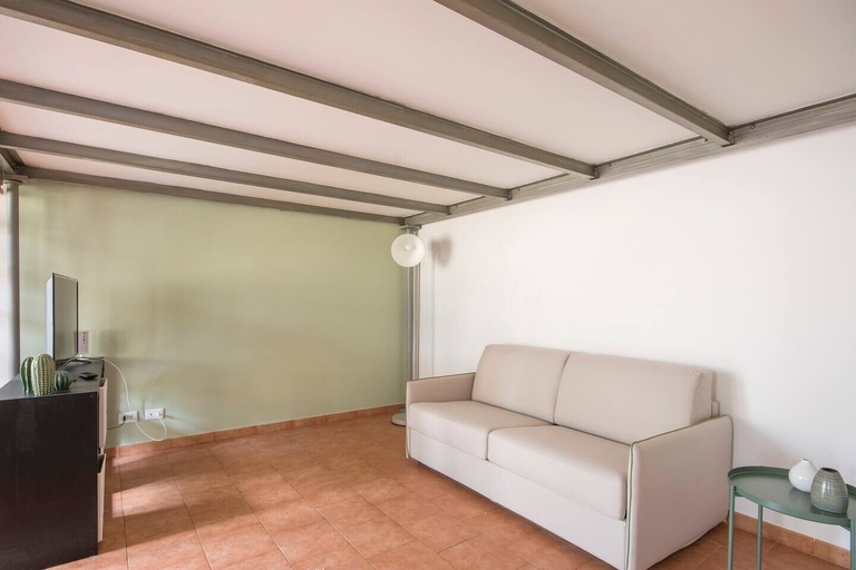 Living area, JOIVY Green Terraced House, Pisa