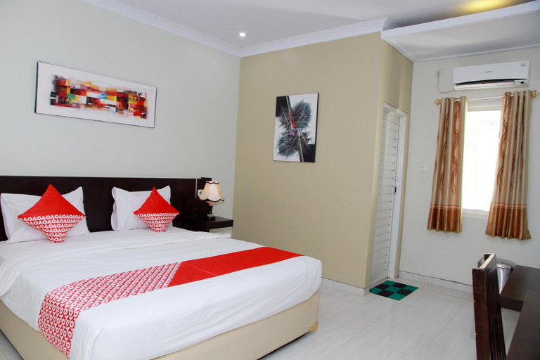 Bedroom 2, OYO 1559 Pondok Garuda Guest House, Palu