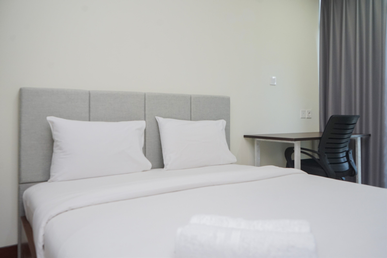 Cozy and Warm Studio Apartment at B Residence By Travelio, South Tangerang