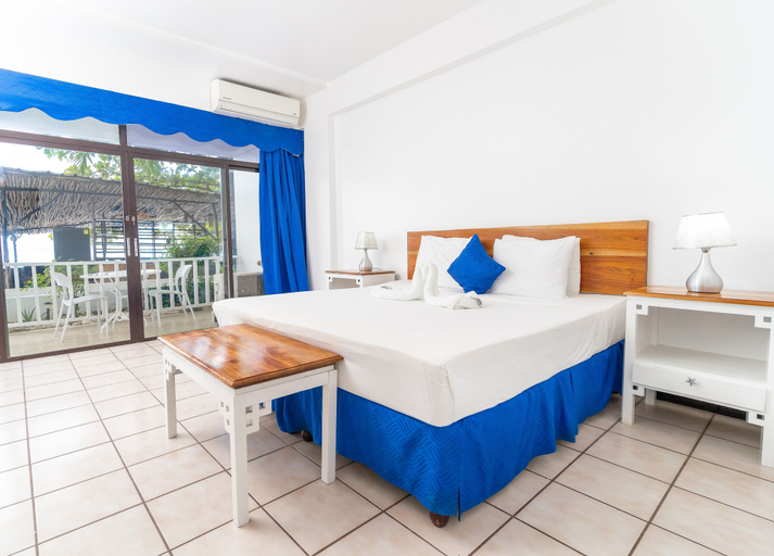 Bedroom 4, Sand And Tan Beach Hotel