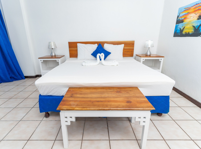 Bedroom 4, Sand And Tan Beach Hotel