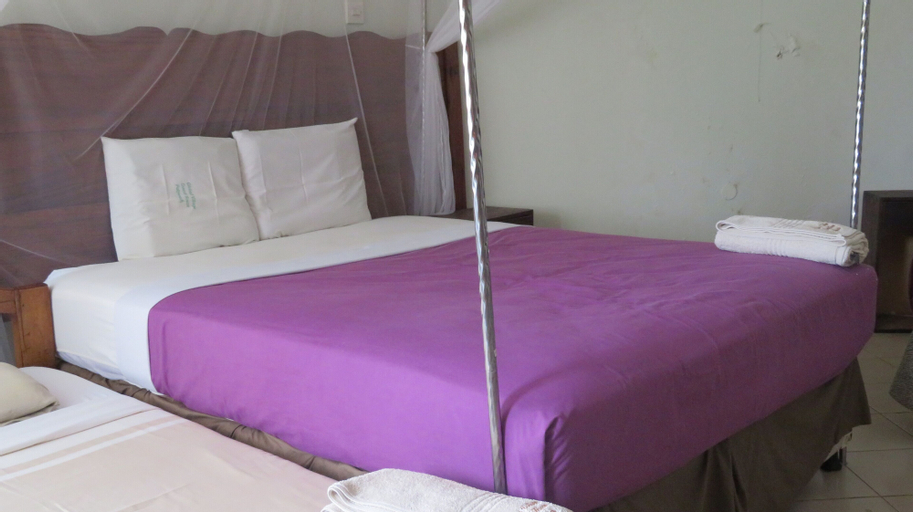 Bedroom 2, Global Village Hotel, Jonam