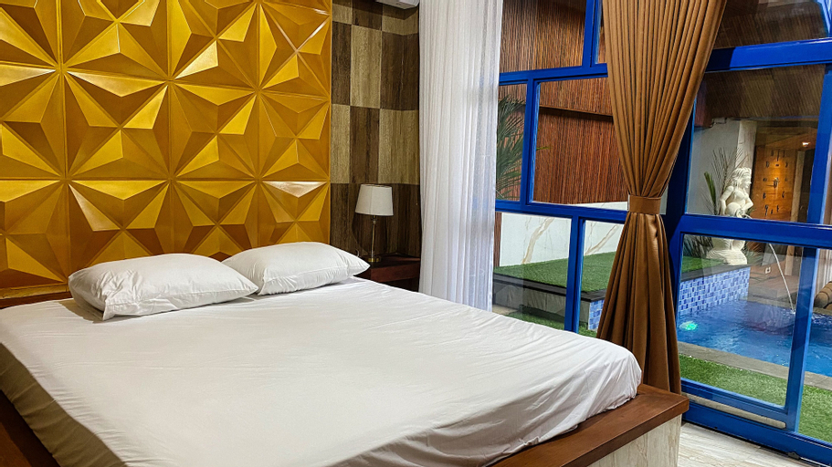 Bedroom 4, Anny Guesthouse by ecommerceloka, Denpasar