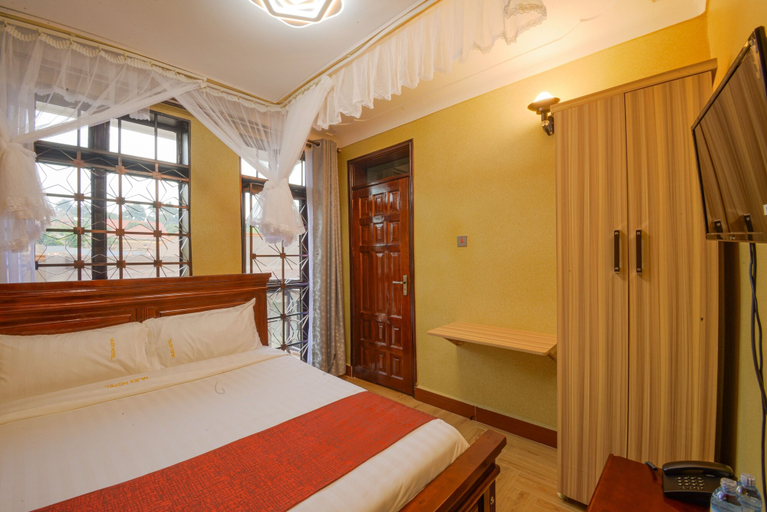 Bedroom 4, Mlex Hotel, Busiiro