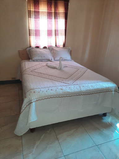 Bedroom 5, Royal Savanna Inn Hotel