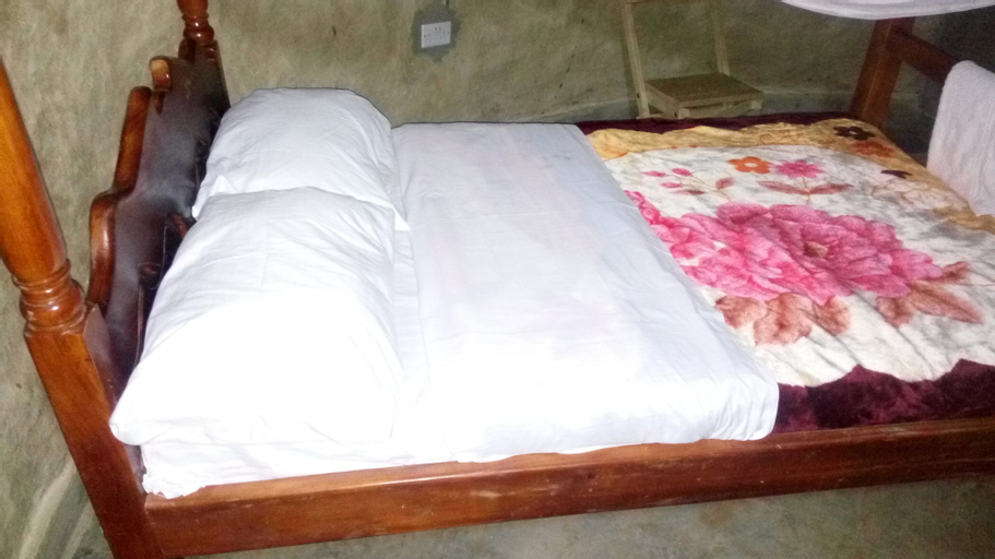 Bedroom 4, Grassroots Cottages & Tours, Nwoya