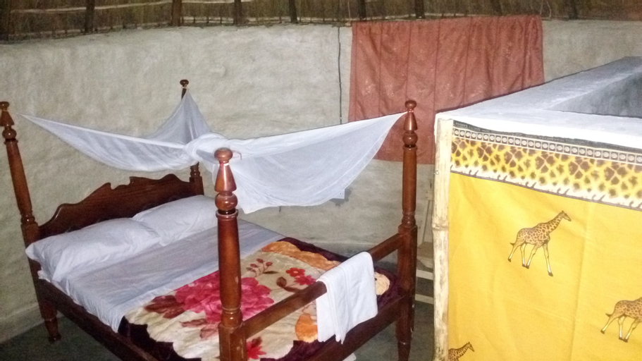 Bedroom 2, Grassroots Cottages & Tours, Nwoya