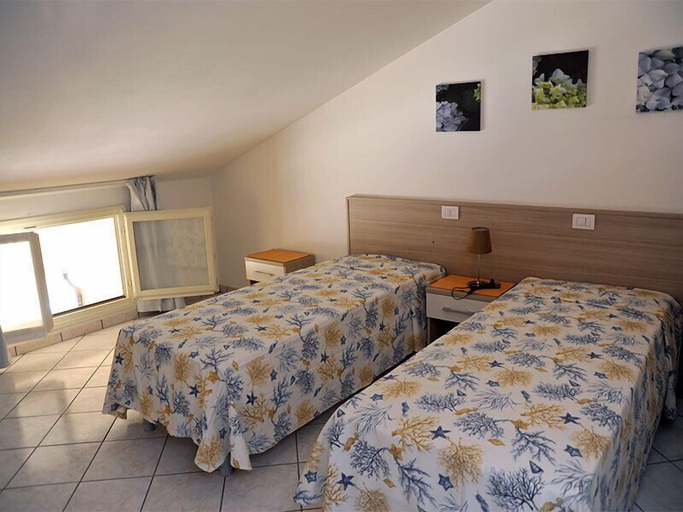 Room 3, Confort, Ferrara