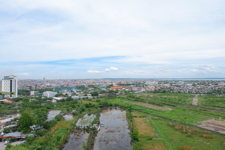 Exterior & Views, Exquisite and Vibrant 2BR Apartment at Taman Melati Surabaya By Travelio, Surabaya