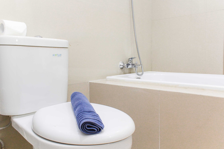 Bathroom 5, Nice and Comfort Studio Room at Azalea Suites Apartment By Travelio, Cikarang