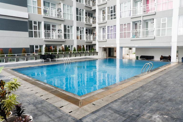 Sport & Beauty, Exquisite and Vibrant 2BR Apartment at Taman Melati Surabaya By Travelio, Surabaya
