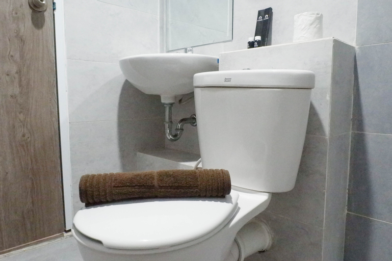 Bedroom 2, Exquisite and Vibrant 2BR Apartment at Taman Melati Surabaya By Travelio, Surabaya