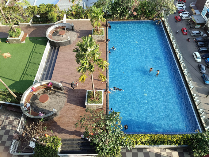 Sport & Beauty, Warm and Homey Studio at Vida View Makassar Apartment By Travelio, Makassar