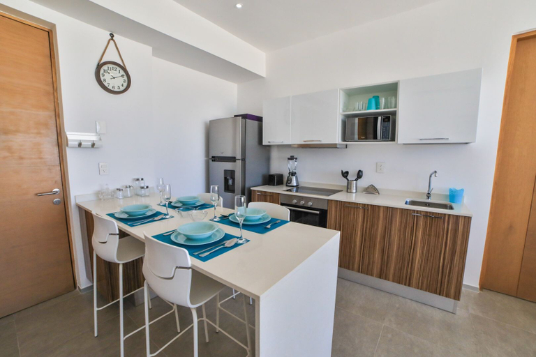 Others 5, The City 1309 N, Cozumel