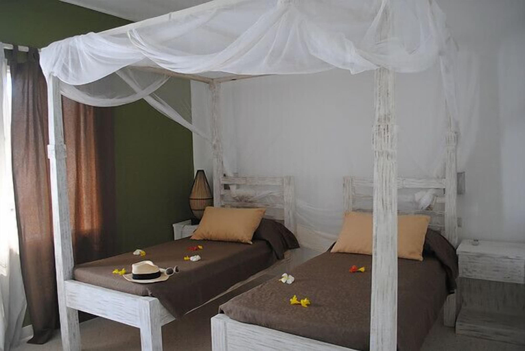 Bedroom 3, Kola Beach Resort, Magarini