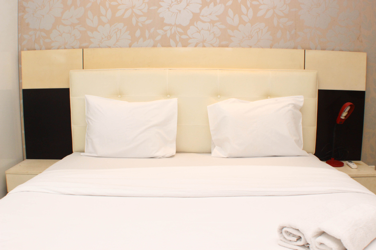 Bedroom 1, Elegant and Strategic 2BR Apartment at Sahid Sudirman Residence By Travelio, Central Jakarta