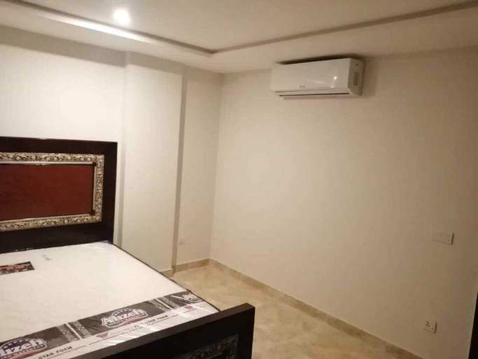 Others 5, Captivating 1-bed Apartment Fully Furnished, Lahore
