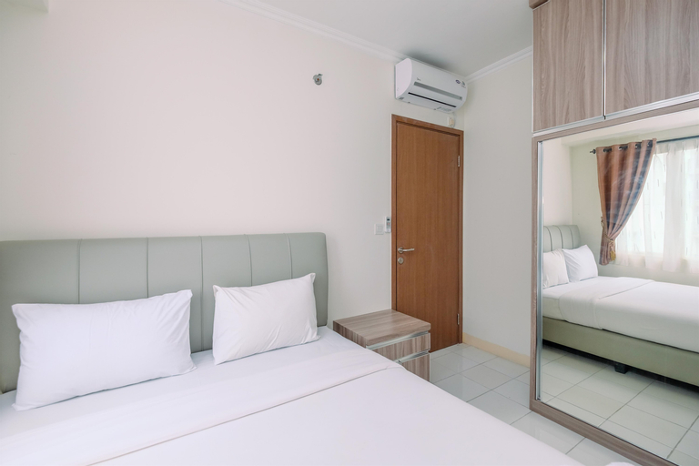 Bedroom 1, Comfy and Tidy 2BR Podomoro Golf View Apartment By Travelio, Bogor