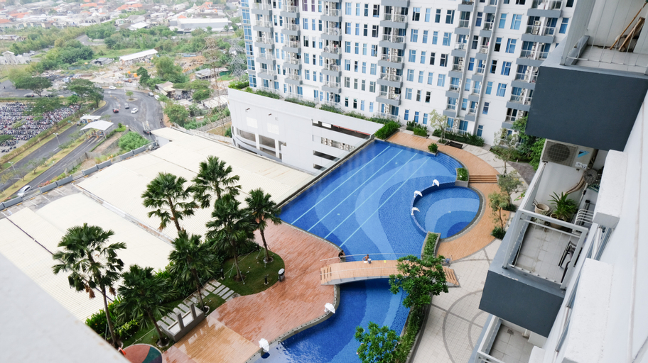 Cozy Stay Studio Connected with Mall at Supermall Mansion Apartment By Travelio, Surabaya