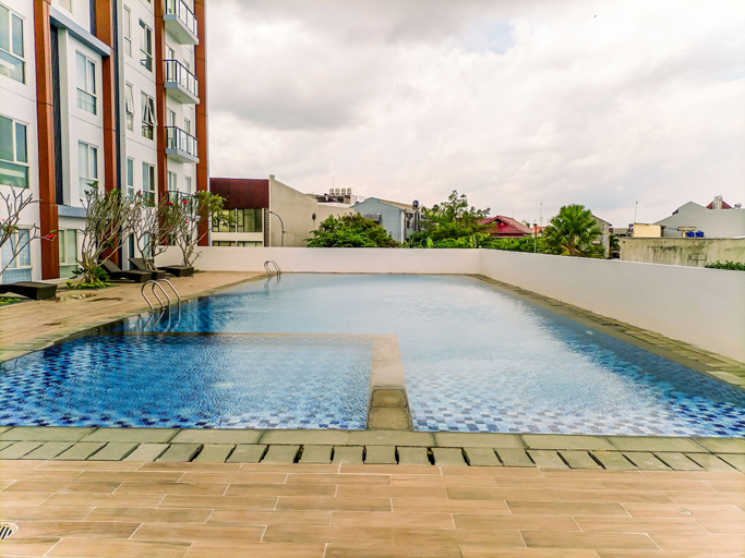 Outdoor pool, Cozy Studio Room At Barsa City Apartment, Sleman