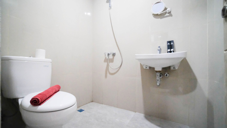 Bedroom 5, Nice and Comfy Studio at Grand Dharmahusada Lagoon Apartment By Travelio, Surabaya