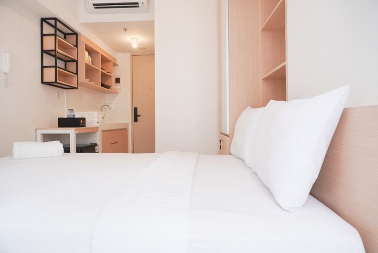 Bedroom 3, Warm and Simply Studio at Tokyo Riverside PIK 2 Apartment By Travelio, Tangerang