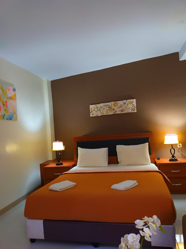 Amoda Hotel dan Cafe Room Type - Deluxe Room