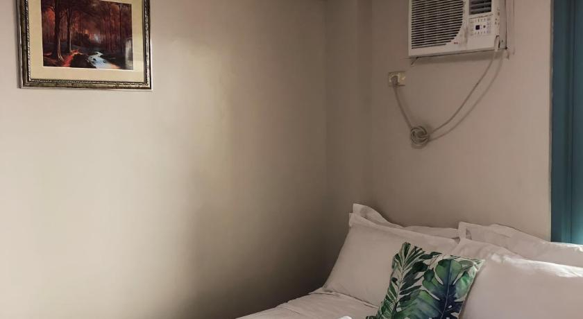 Bedroom 1, Tivoli Garden Residences 2212 Lovely stay in a 2-BR condo w/ Netflix and Balcony, Mandaluyong