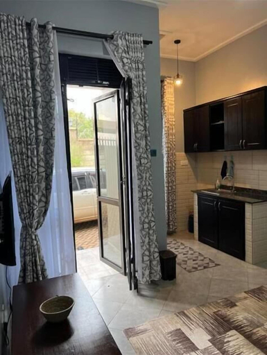 Others 5, MUNDELI HOMES LTD, Busiiro