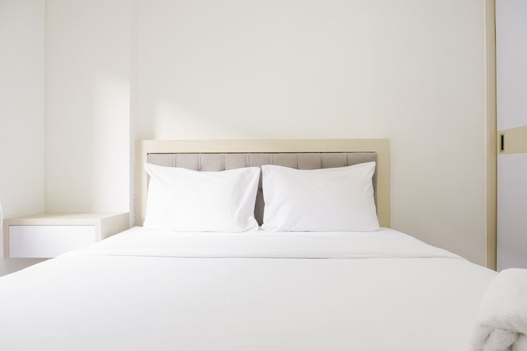 Bedroom 1, Pleasurable 2BR at Podomoro Golf View Apartment near Tol Cimanggis By Travelio, Bogor