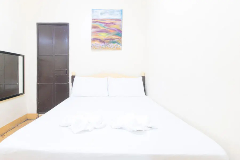 Bedroom 2, Golden Sunrise Hotel I by RedDoorz, Balungao